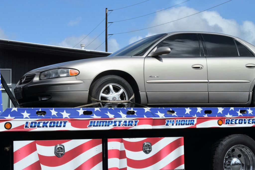 Front view of a silver sedan, professional car service and towing in Palm Coast, Florida